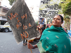 3 woman with sign  3